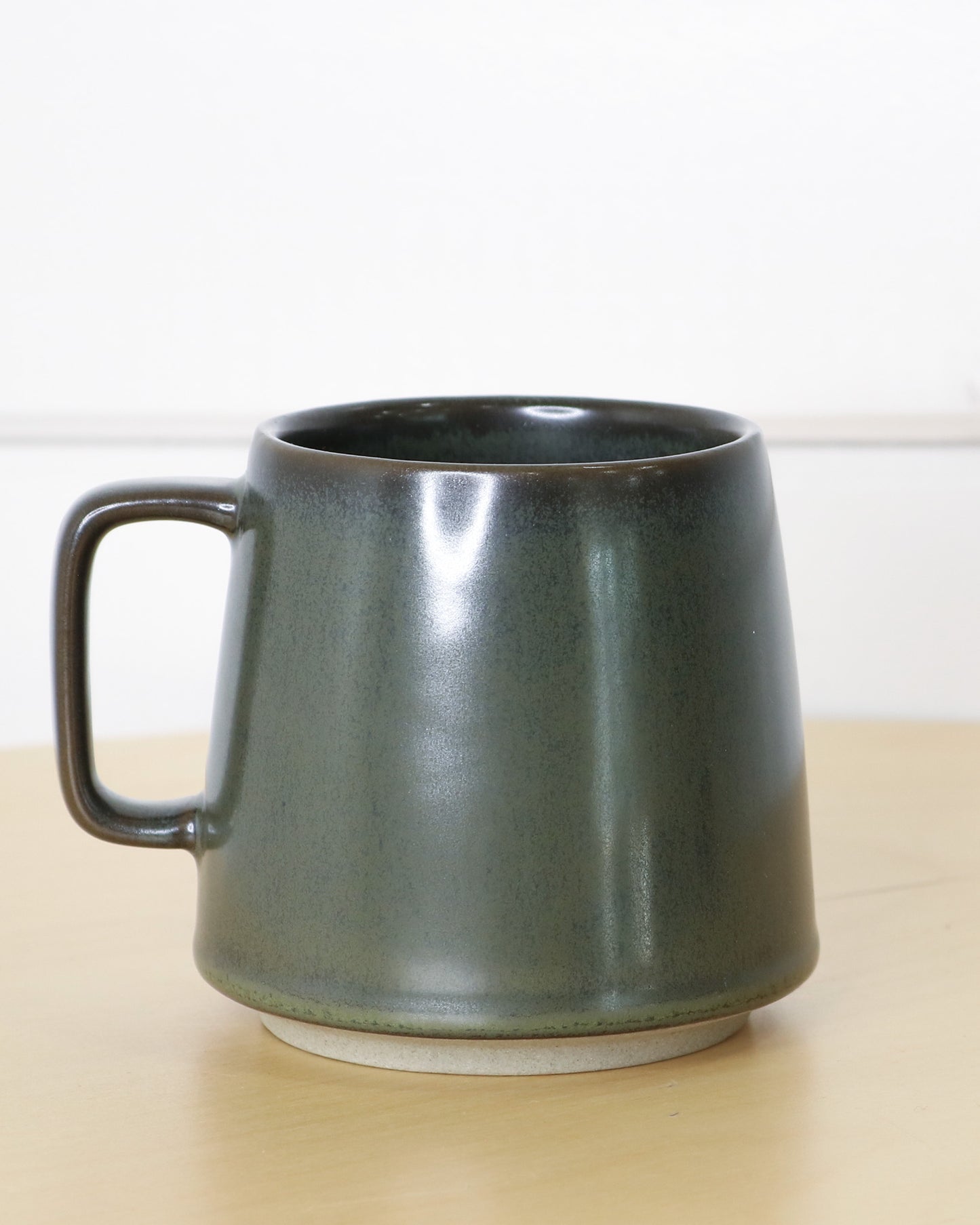 Earthy Green Ceramic Mug With Handle and Biking Bison Logo, Back